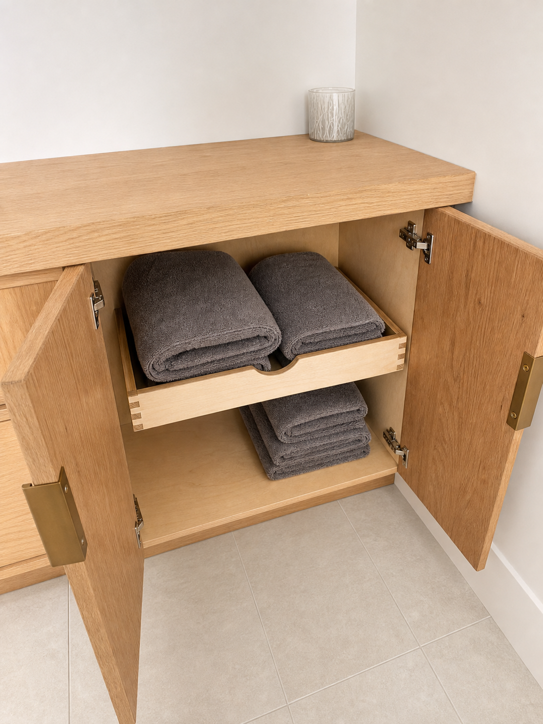 Full bathroom suite — warm white oak throughout